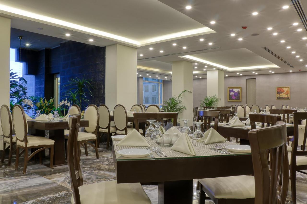 Carnival Hotel Аман Екстериор снимка