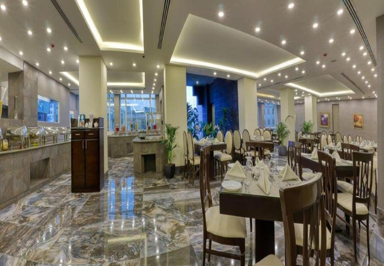 Carnival Hotel Аман Екстериор снимка