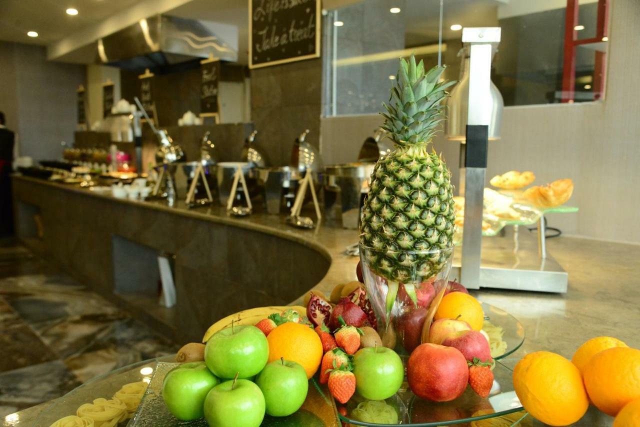 Carnival Hotel Аман Екстериор снимка